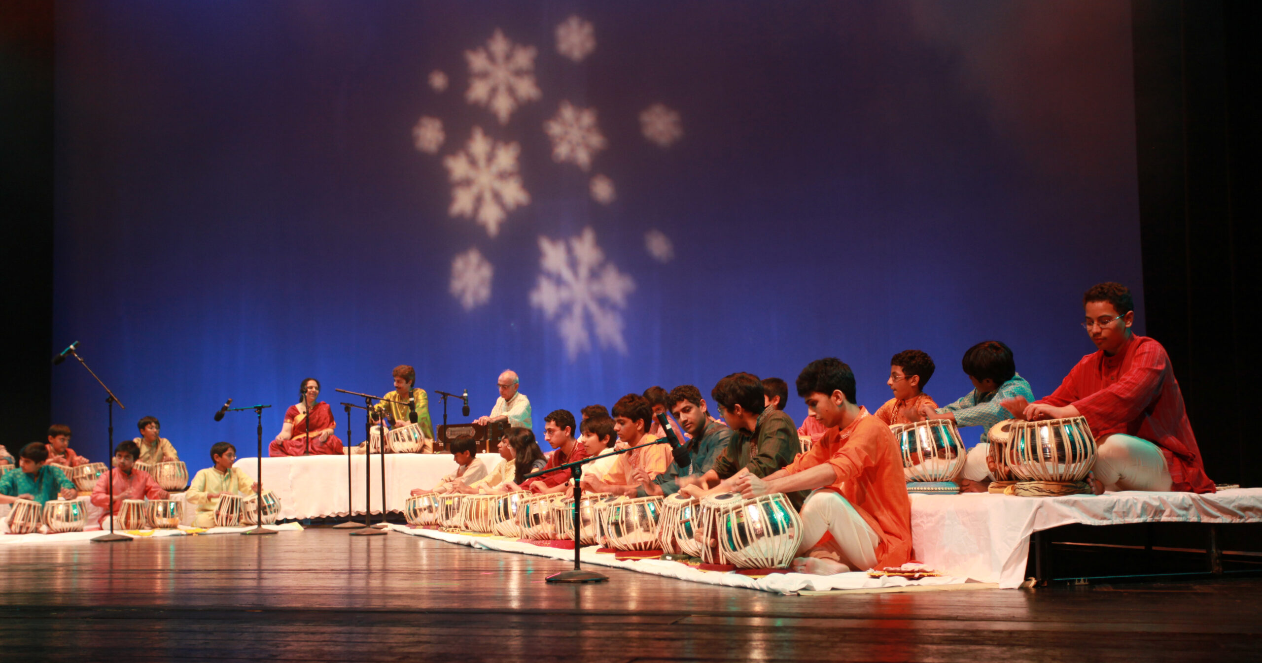 40 tabla students performing with Tabla Guru Pandit Shantilal Shah during Incredible India at Miller Outdoor Theater