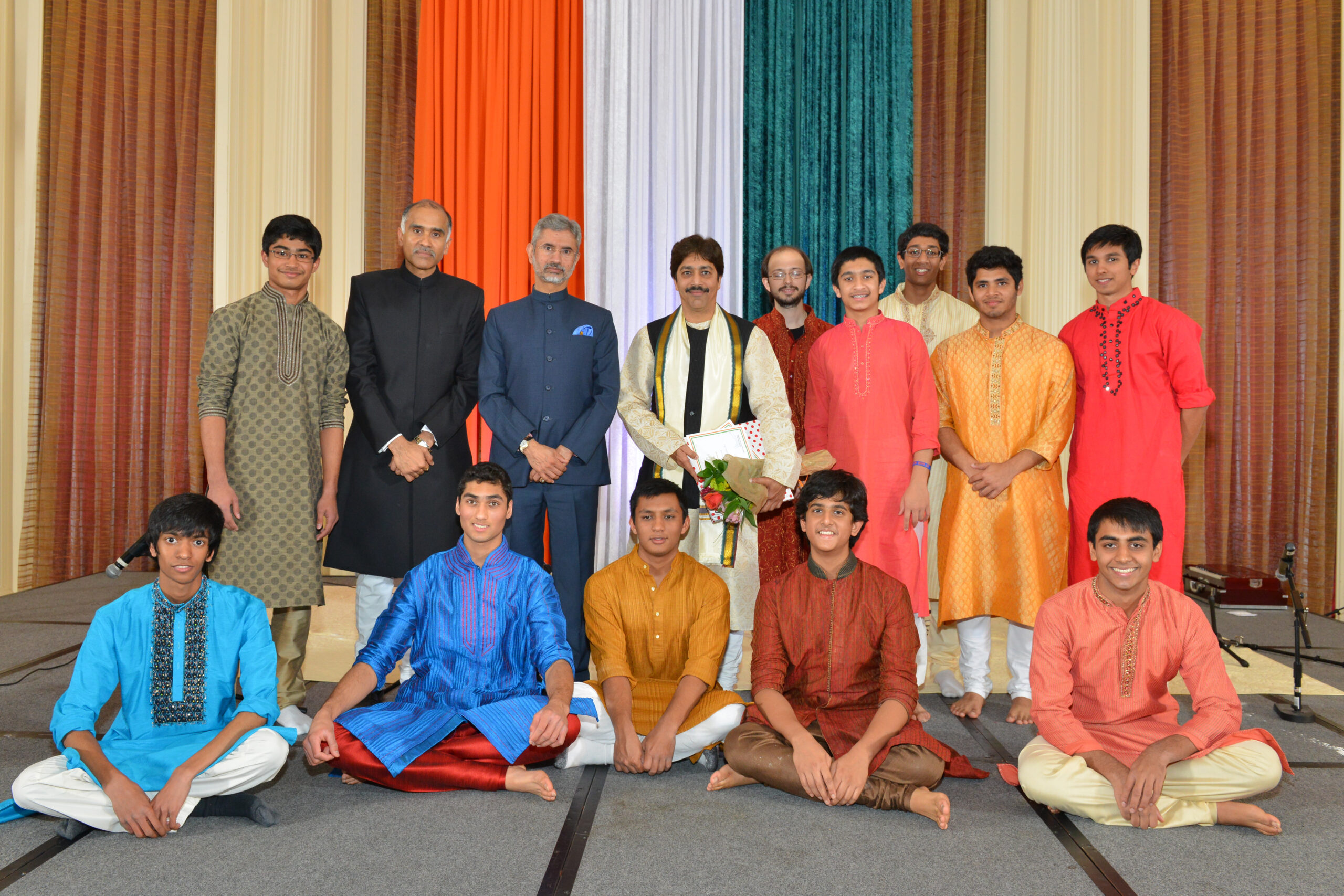 Students of Tabla Guru Pandit Shantilal Shah pose for a picture with the Indian Ambassador